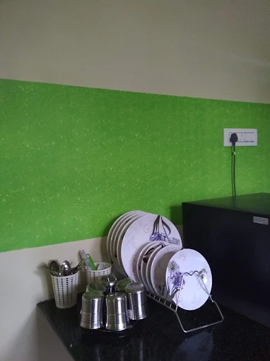 Kitchen counter with crockery and utensils